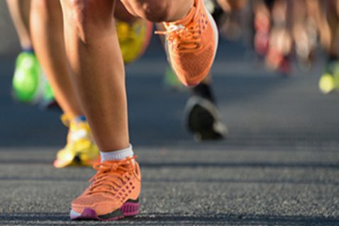 People running on asphalt.