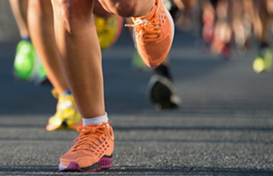 People running on asphalt.